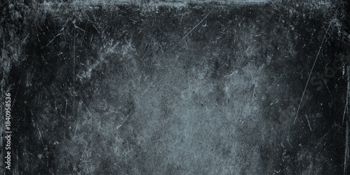 Dark distressed gray wall texture with subtle scratches and vintage for modern background design.