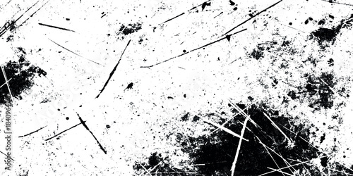 Abstract black and white grunge overlay texture featuring realistic scratches and white gritty grunge background.