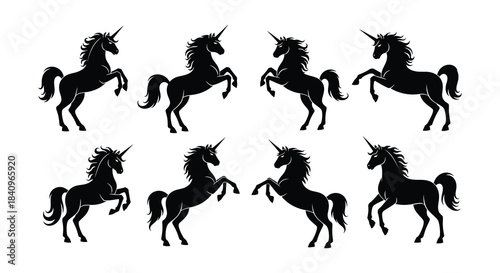 Collection of black silhouette unicorn illustrations in various rearing poses