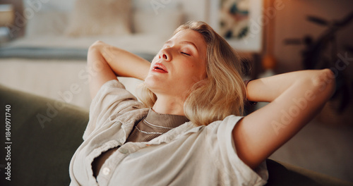 Foto Woman, tired and rest on living room sofa for weekend break and breathe in home
