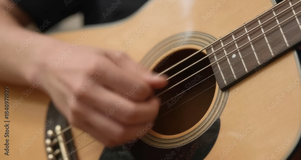 Fototapeta premium Close-up of a guitar string vibrating, motion blur, music concept
