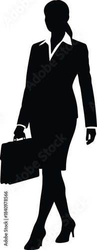 Silhouette of a businesswoman walking with a briefcase