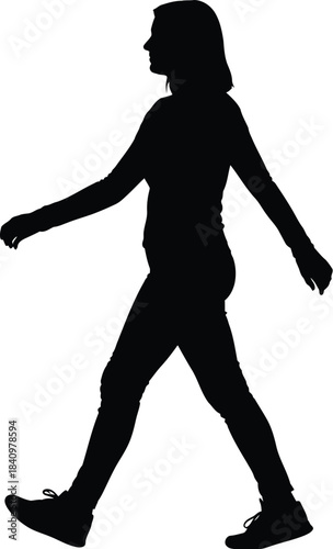Silhouette of a woman walking confidently from left to right