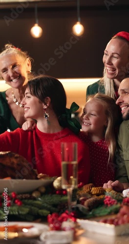 Christmas, dinner and happy family in home with selfie for memories, bonding or holiday tradition. People, smile and photography in house for festive party, social media xmas post or supper together.