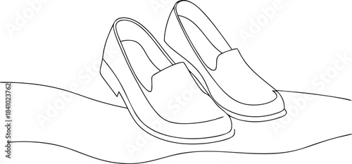 Pair of White Sneakers with Black Outlines on Wavy Surface
