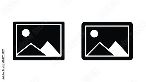 Two black frames with a white circle and mountain silhouette inside