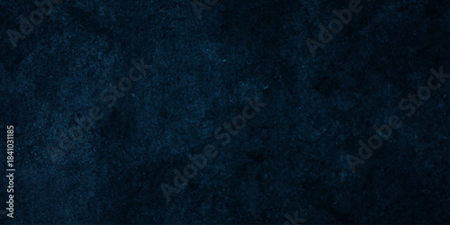 Dark blue grunge concrete aged vintage structure studio scratch backdrop background.