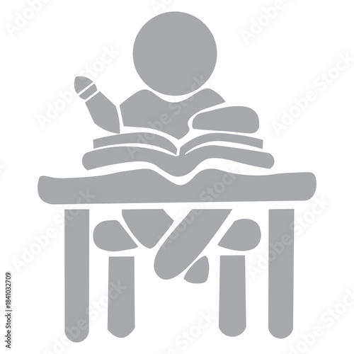 child at the table learning to write