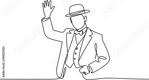 Man in suit and hat waving with one arm raised bow tie
