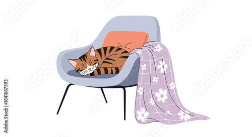 A cute ginger tabby cat sleeping peacefully in a cozy modern armchair, curled up with a pillow and a soft patterned blanket.