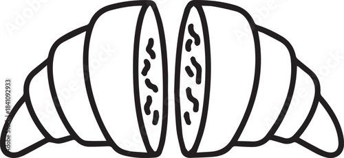 Croissant Delight: A precisely sliced croissant unveils its interior texture, highlighting the flaky layers and delicious details of this classic baked good. 