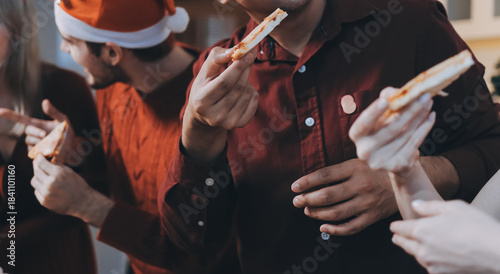Festive Office Christmas Party with Delicious Food. A beautifully decorated office space with Christmas trees and festive lights, set up for a holiday party.