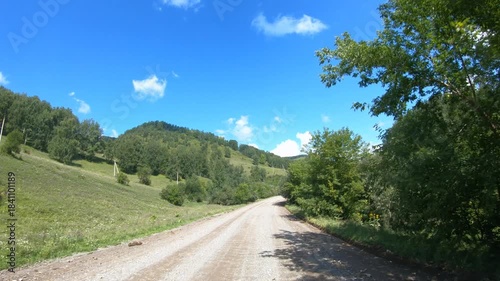 Video of driving in a car In summer season along country road in Altai region. Route from settlement Cherga to village Altaiskoe.