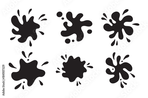 Black ink splatters and splashes blot drop