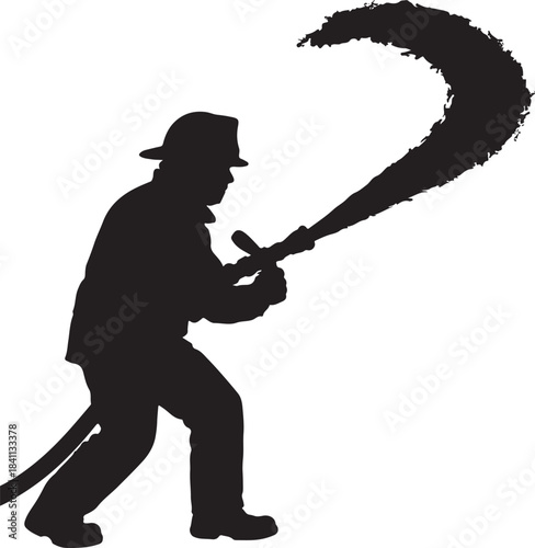 Firefighter heroically spraying a powerful stream of water from a hose