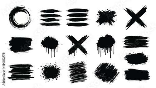Collection of various black paint brush strokes and marks on a white background.
