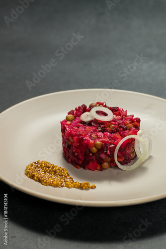 Classic Russian Beet Salad with Mustard Seeds on Plate. Vinaigrette