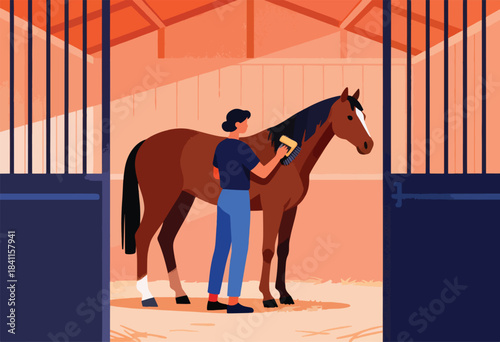 A person grooms a brown horse in a stable. The scene is inside a barn with a warm color palette