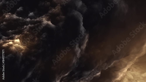 Dramatic black storm clouds move over moody sky in surreal stylised weather scene
