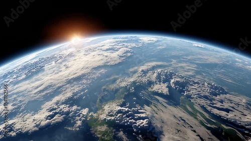 Stunning view of earth from space with sunrise over horizon and cloud formations