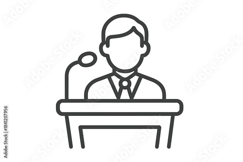 Speaker delivers a talk at a podium during a conference event in a hall with an audience present listening attentively