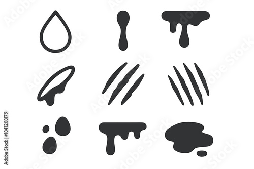 Different black shapes that represent liquid and scratch marks on a white background for design work or art projects