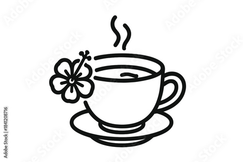 Cup of tea with flower decoration on the table in a warm setting during afternoon