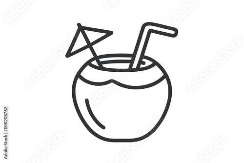 Coconut drink with umbrella and straw on a summer day in a tropical location