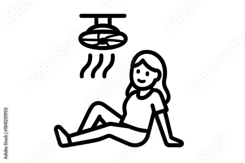 Woman sitting on the floor enjoying a ceiling fan during a warm afternoon inside a house