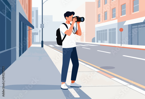 A person with a backpack takes photos with a camera on a city street. Buildings line the street