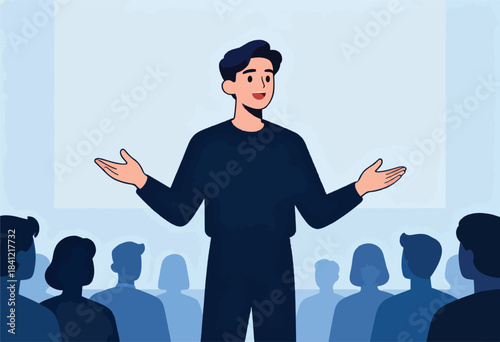 A man in dark attire gestures with open arms to an audience in a presentation setting