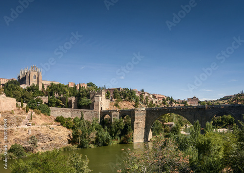 san martin bridge on tagus river in old town toledo spain