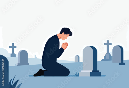 A person kneels at a graveyard, with head bowed in prayer, near tombstones and a cross. A solemn scene