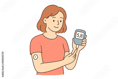 Young woman checking her blood glucose level with a glucometer for diabetes management and health monitoring