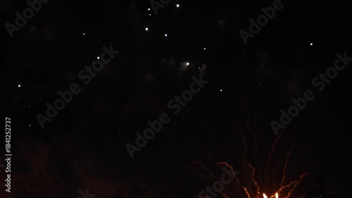 Amazing real beautiful colorful fireworks background on celebration night event for happy new year party, Abstract Multi color golden firework in the night sky