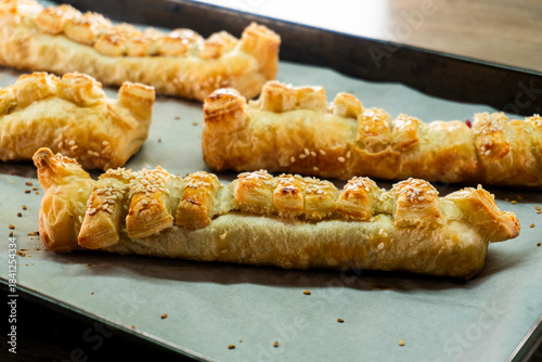 Puff pastry with strawberry jam. Jam-filled pastries. Food concept.