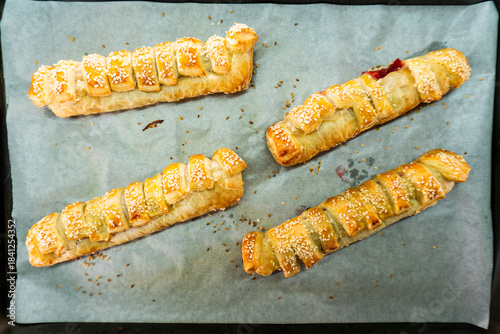 Puff pastry with strawberry jam. Jam-filled pastries. Food concept.