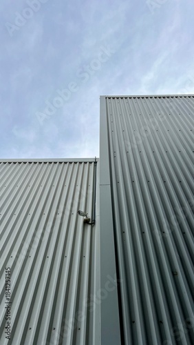 modern office building with video camera on the top