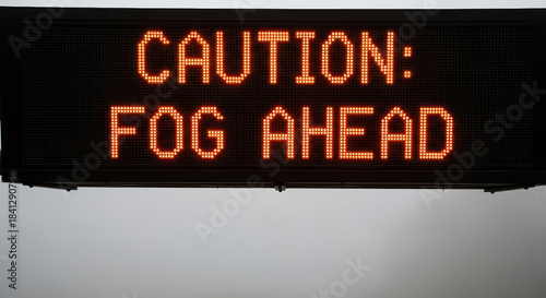 An electronic LED sign displays a 