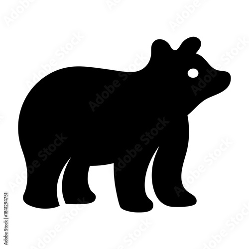 Silhouette of a bear in black with a visible eye element