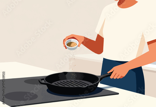 Person sprinkling spices into a cast iron pan on a stovetop