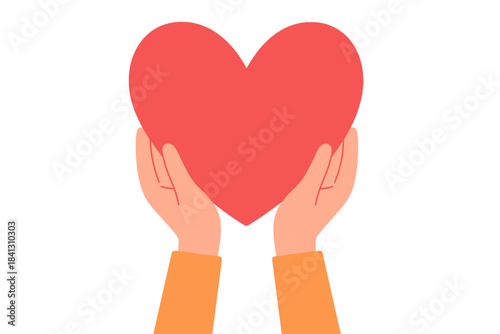 Human hands gently holding a large red heart symbol of love and charity