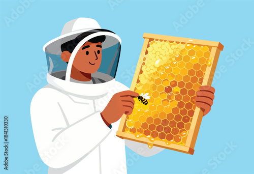 Beekeeper in protective suit inspects a honey-filled honeycomb frame with a bee