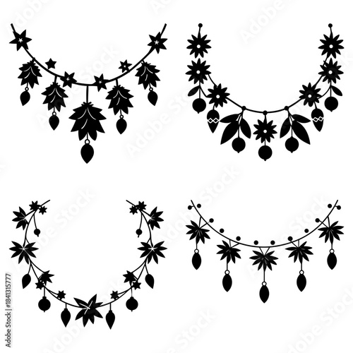 Four Black and White Garland Decorations with Leaves Stars and Ornaments