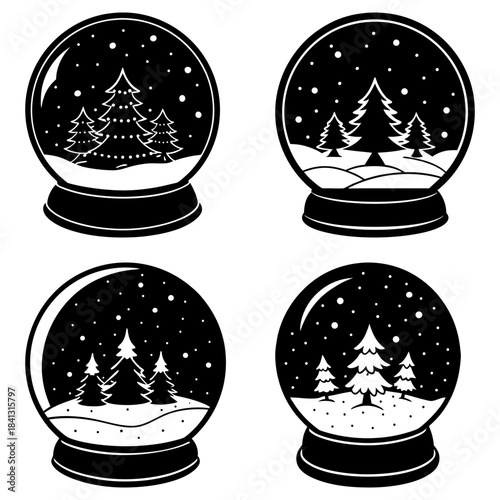 Four black and white snow globes with winter forest scenes inside trees