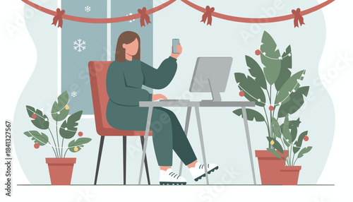 Woman working remotely during the holidays checking her phone at a festive home office desk