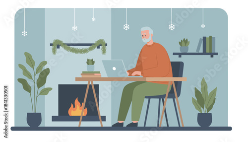 Senior man working remotely on a laptop in a cozy festive winter home office by a warm fireplace