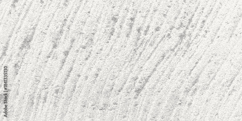 Grungy dotted surface with noisy dust and soft grain. Faded concrete tone and stone wall mood. Vintage distressed background.