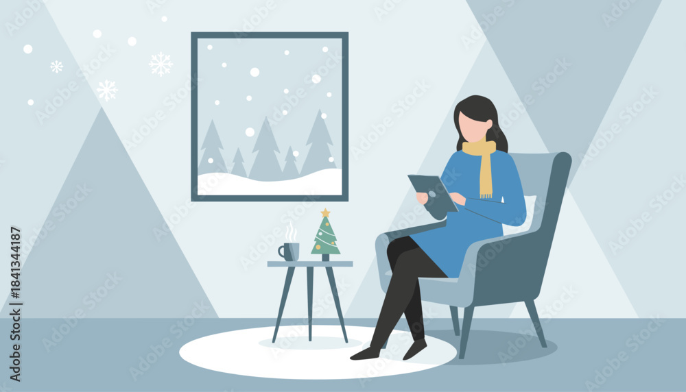 Fototapeta premium Woman reading tablet by window on cozy winter day Christmas tree hot drink indoor comfort