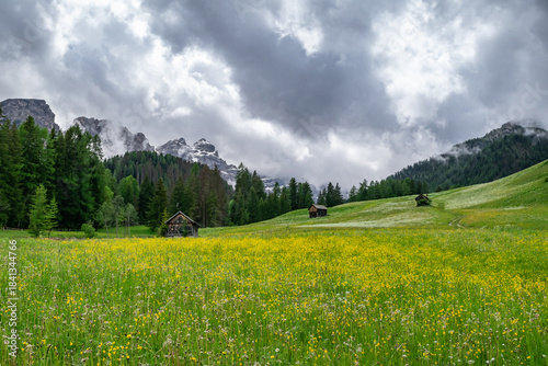 Val di Moris, Seres, spring landscape in the Dolomites with cloudy sky